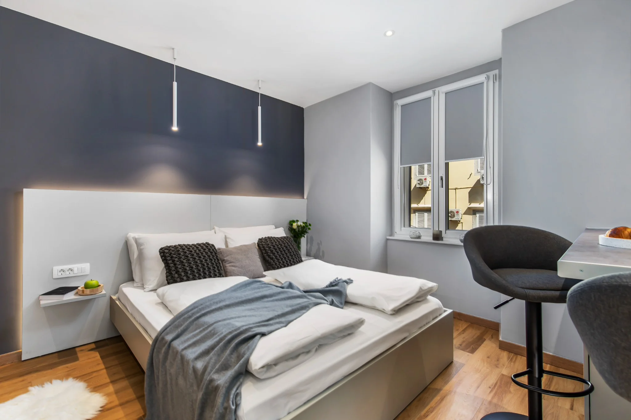 Apartment 1 with king-size bed and bar table